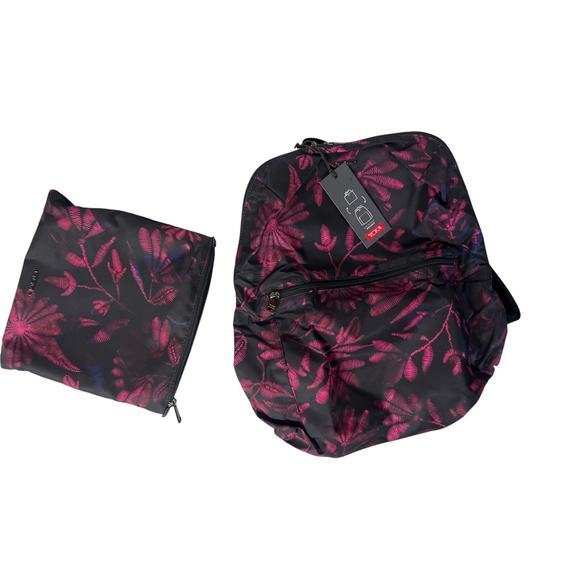 New nwt Tumi just in case backpack printed floral  purple black travel emergency - Picture 1 of 9